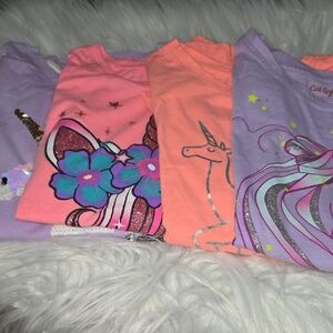 Lot of 4 Unicorn and Floral Graphic Girls Tees- size Medium (7/8)
